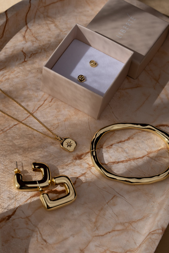 Verity Gold Hinged Bangle